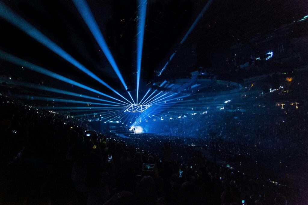 An electrifying concert with a captivating light show, perfect for music enthusiasts.